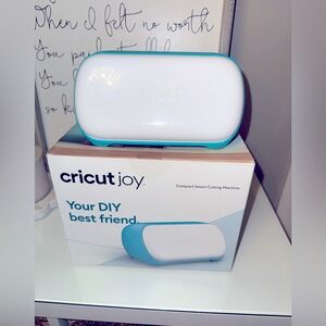 Cricut Joy Smart Cutting Machine in White and Teal.
Practically new!!!